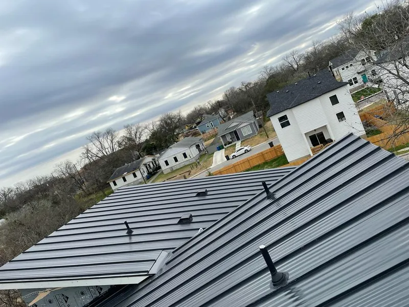 Standing seam metal roof panels with vents for Skylight Repair in Loudon